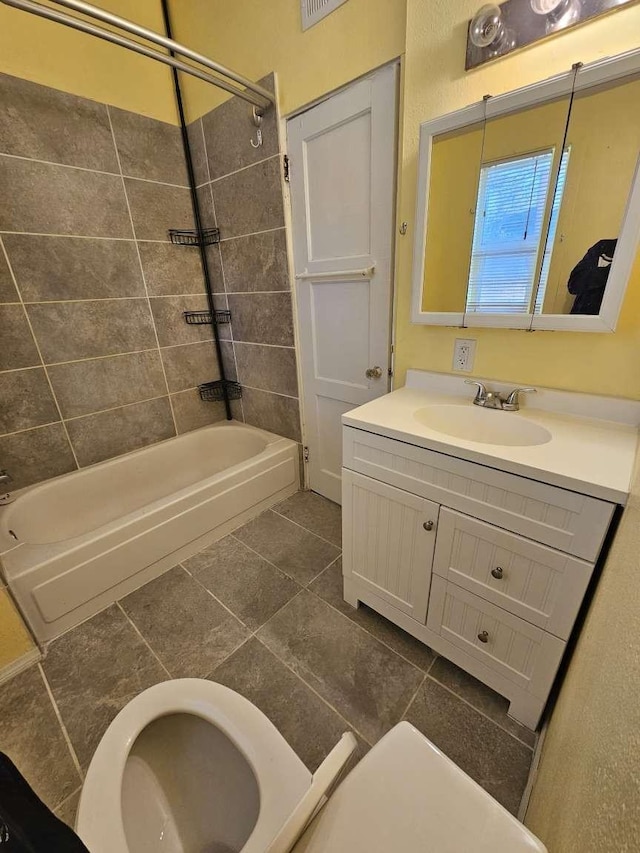 3546 Questa Dr, Los Alamos, NM 87544 - full bathroom featuring toilet, tile patterned floors, vanity, and bathtub / shower combination
