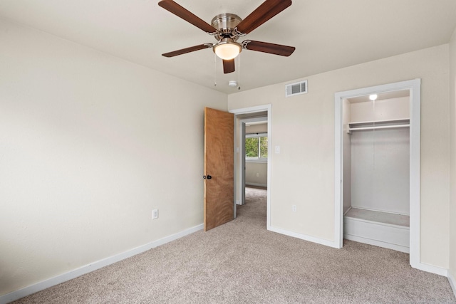 2141 44th St Unit C, Los Alamos, NM 87544 - unfurnished bedroom featuring carpet flooring, baseboards, a closet, and ceiling fan