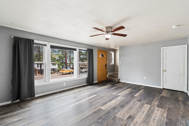 2141 44th St Unit C, Los Alamos, NM 87544 - unfurnished room with wood finished floors, a ceiling fan, and baseboards
