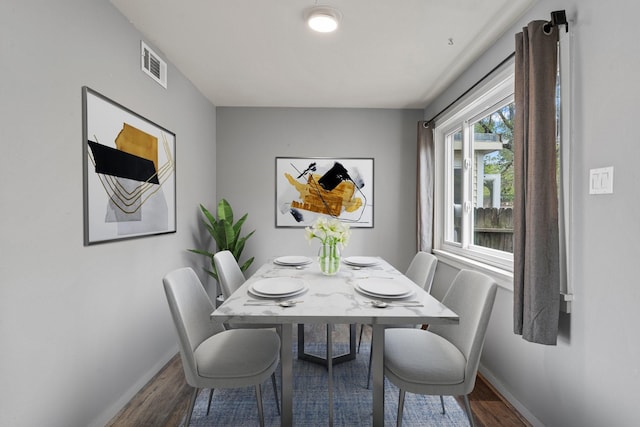 2141 44th St Unit C, Los Alamos, NM 87544 - dining space featuring wood finished floors and baseboards