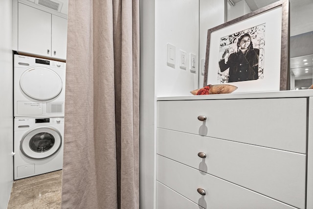 161 S Armijo Ln, Santa Fe, NM 87501 - laundry room featuring stacked washing machine and dryer