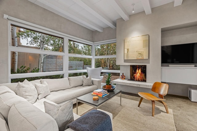 161 S Armijo Ln, Santa Fe, NM 87501 - living area with beamed ceiling, plenty of natural light, and a high end fireplace