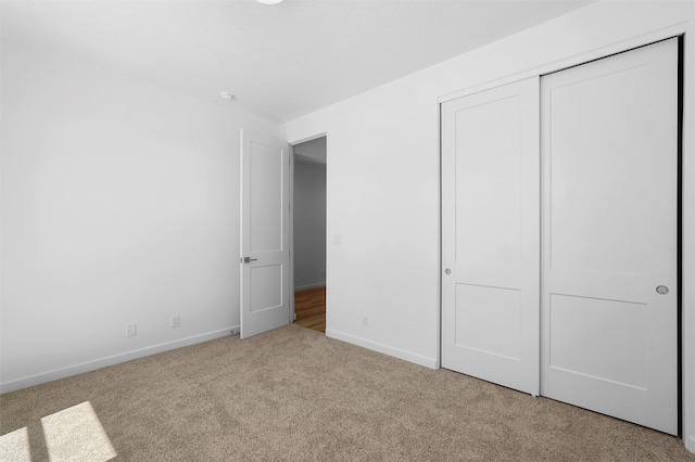 85 Cadena Blvd, Los Alamos, NM 87547 - unfurnished bedroom with carpet, baseboards, and a closet