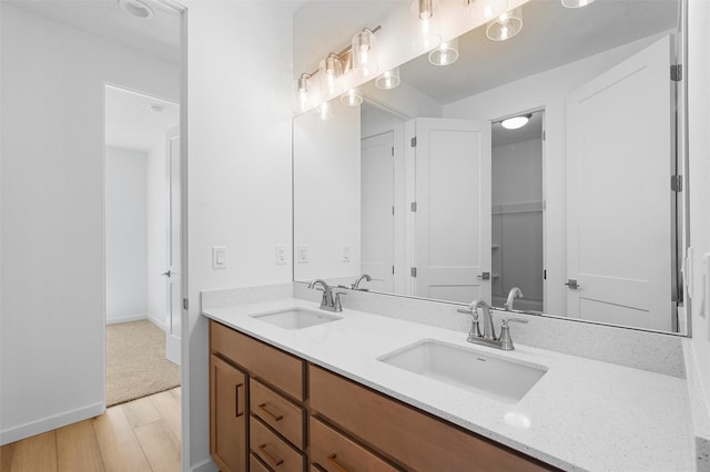 85 Cadena Blvd, Los Alamos, NM 87547 - bathroom with wood finished floors and double vanity