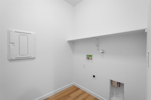 85 Cadena Blvd, Los Alamos, NM 87547 - laundry room with light wood-type flooring, gas dryer hookup, washer hookup, baseboards, and electric dryer hookup
