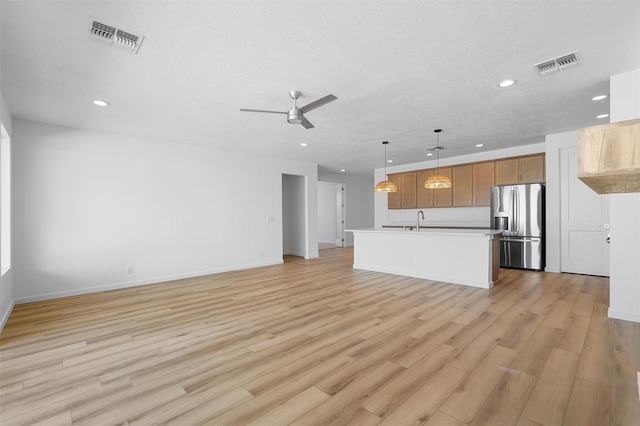 85 Cadena Blvd, Los Alamos, NM 87547 - unfurnished living room featuring recessed lighting, ceiling fan, light wood-style floors, a sink, and baseboards