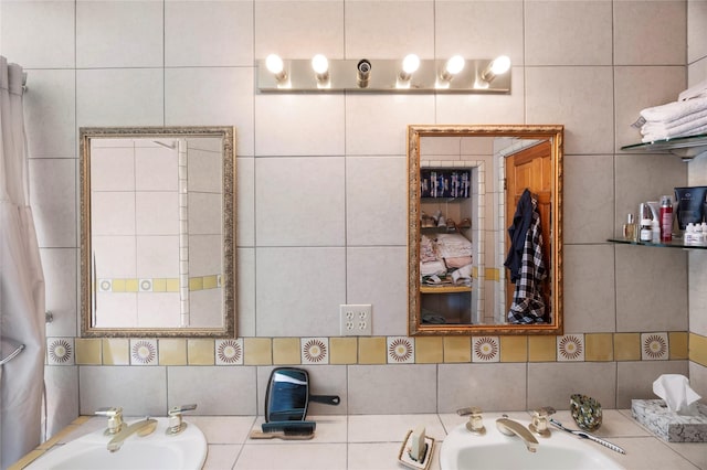 1 Azul Pl, Santa Fe, NM 87508 - bathroom with a sink, tile walls, and backsplash