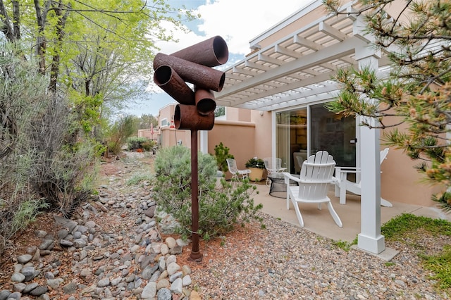 663 Bishops Lodge Rd Unit 71, Santa Fe, NM 87501 - view of yard featuring a pergola and a patio area