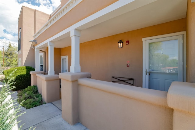 663 Bishops Lodge Rd Unit 71, Santa Fe, NM 87501 - view of exterior entry with stucco siding
