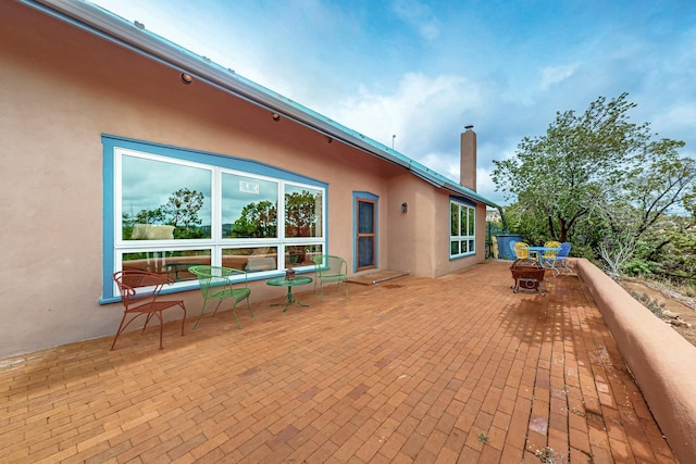 25A Lime Kiln Rd, Lamy, NM 87540 - view of patio / terrace featuring a fire pit