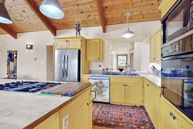 25A Lime Kiln Rd, Lamy, NM 87540 - kitchen featuring black appliances, a sink, beamed ceiling, light countertops, and wood ceiling