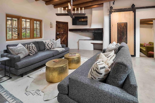 942 Canyon Unit A & B, Santa Fe, NM 87501 - living area featuring a barn door, concrete floors, and beam ceiling