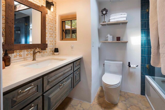 942 Canyon Unit A & B, Santa Fe, NM 87501 - bathroom with vanity, toilet, and washtub / shower combination