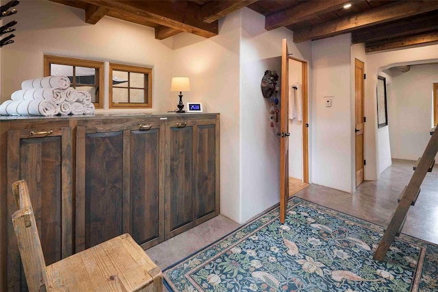 942 Canyon Unit A & B, Santa Fe, NM 87501 - entrance foyer featuring concrete flooring and wooden ceiling with exposed beams