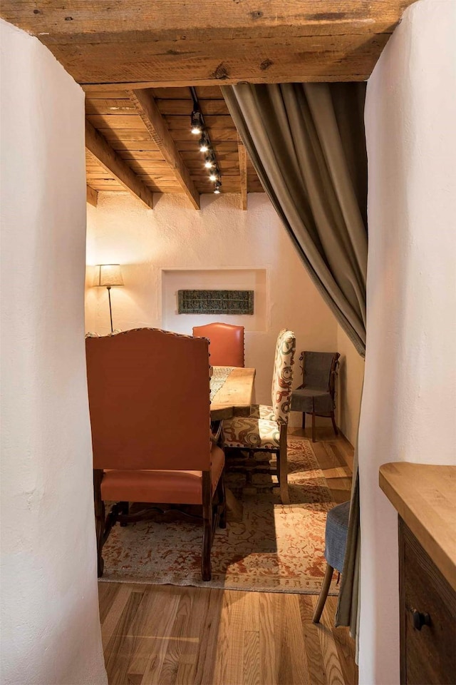 942 Canyon Unit A & B, Santa Fe, NM 87501 - bedroom with wood ceiling with exposed beams, wood finished floors, and rail lighting