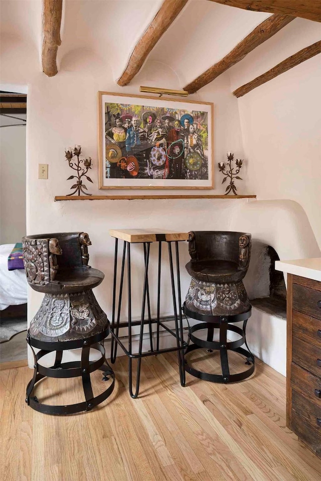 942 Canyon Unit A & B, Santa Fe, NM 87501 - dining area with wood finished floors and beam ceiling
