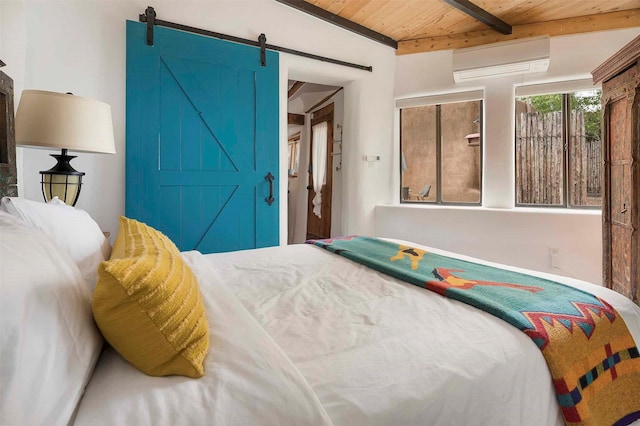 942 Canyon Unit A & B, Santa Fe, NM 87501 - bedroom featuring a wall mounted AC, wood ceiling with exposed beams, and a barn door