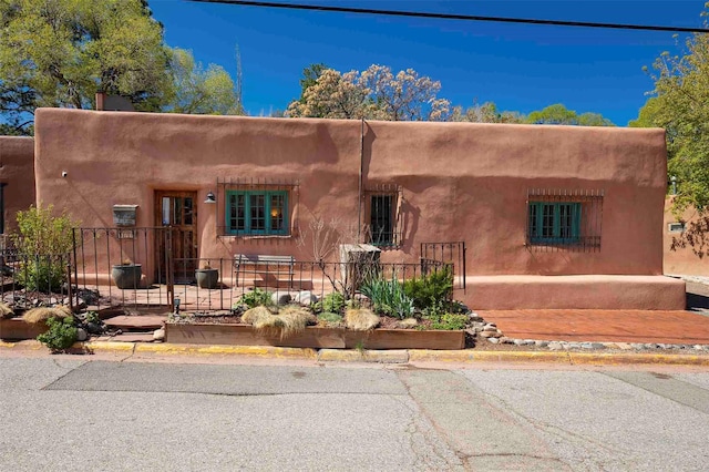 942 Canyon Unit A & B, Santa Fe, NM 87501 - view of pueblo revival-style home