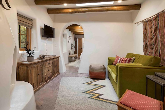 942 Canyon Unit A & B, Santa Fe, NM 87501 - corridor with arched walkways, beam ceiling, and carpet