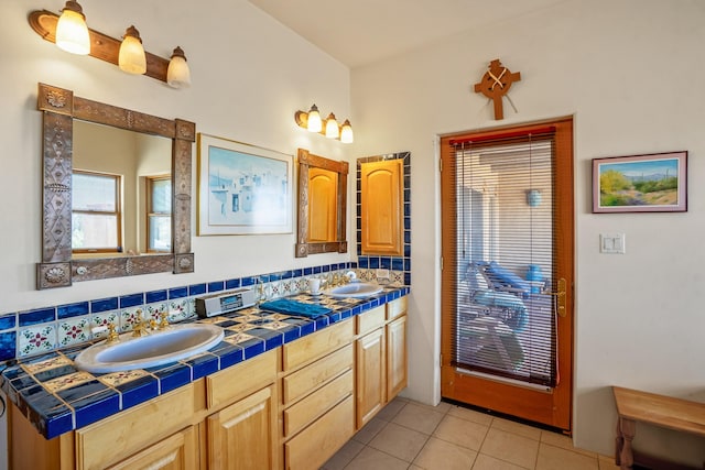 24 Camino Caballos Spur, Lamy, NM 87540 - bathroom featuring tile patterned floors and double vanity