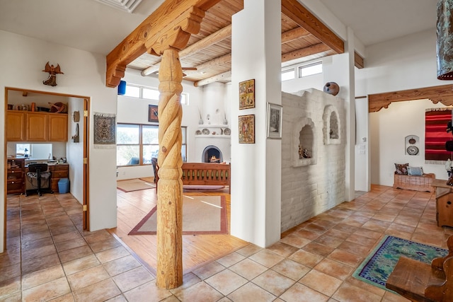 24 Camino Caballos Spur, Lamy, NM 87540 - hall featuring beam ceiling, a desk, and ornate columns