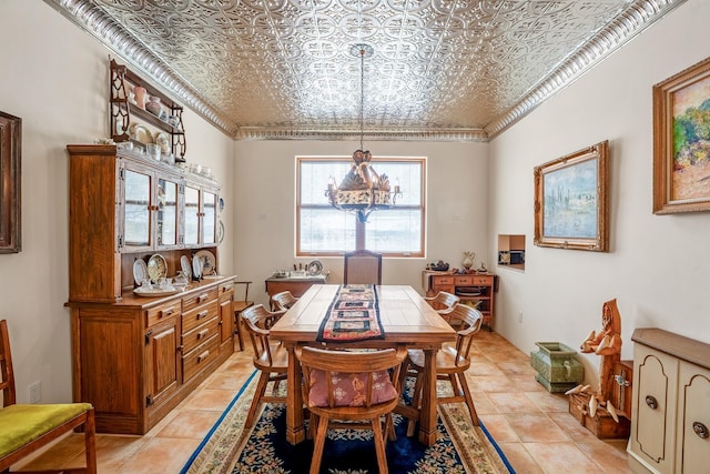 24 Camino Caballos Spur, Lamy, NM 87540 - dining room with an ornate ceiling, light tile patterned floors, a chandelier, and ornamental molding