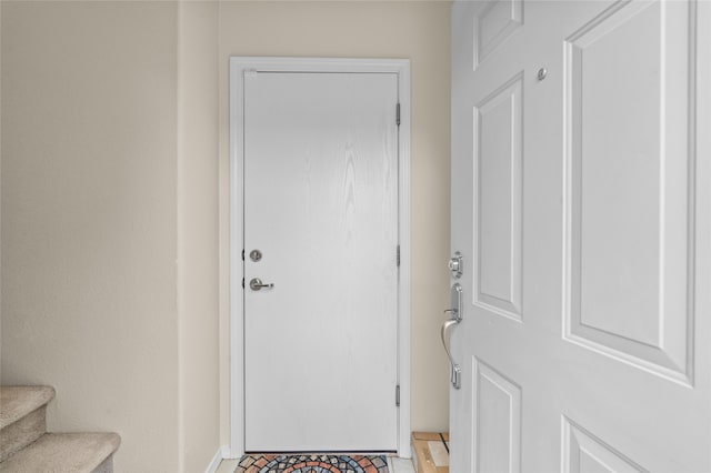 4315 Santo Domingo Unit C, Santa Fe, NM 87507 - doorway with stairway and baseboards