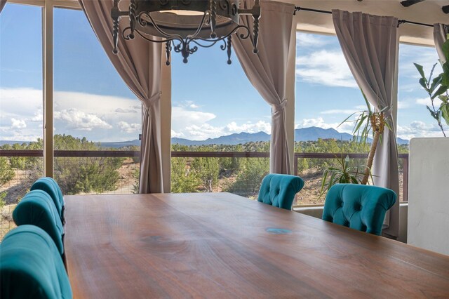 100 Rancho Alegre, Santa Fe, NM 87508 - dining room with a mountain view and a chandelier