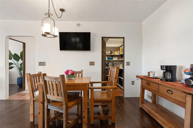 100 Rancho Alegre, Santa Fe, NM 87508 - dining area featuring dark wood-style flooring