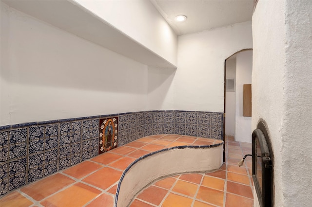 100 Rancho Alegre, Santa Fe, NM 87508 - bathroom with wainscoting, recessed lighting, and tile patterned floors