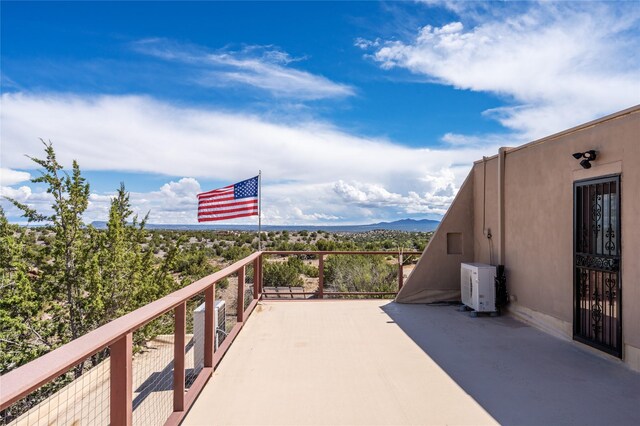 100 Rancho Alegre, Santa Fe, NM 87508 - view of patio / terrace featuring a cooling unit, a balcony, and a mountain view
