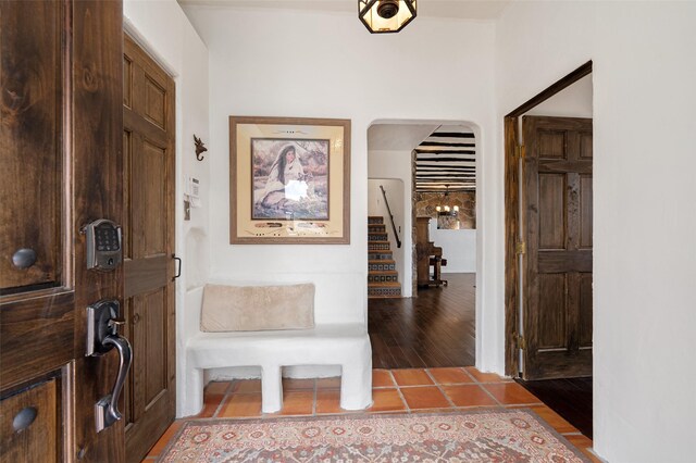 100 Rancho Alegre, Santa Fe, NM 87508 - foyer entrance featuring stairway, arched walkways, and wood finished floors