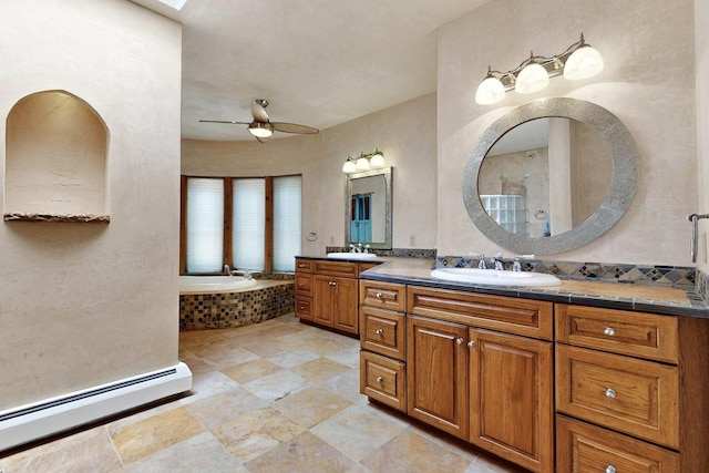 5 Camino Sin Ganas, Santa Fe, NM 87506 - full bathroom featuring a baseboard heating unit, ceiling fan, a garden tub, and vanity