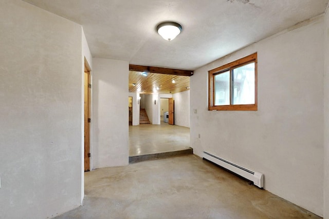 5 Camino Sin Ganas, Santa Fe, NM 87506 - unfurnished room featuring baseboard heating, stairway, and concrete floors