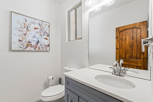 35 La Pradera, Santa Fe, NM 87508 - bathroom featuring toilet and vanity