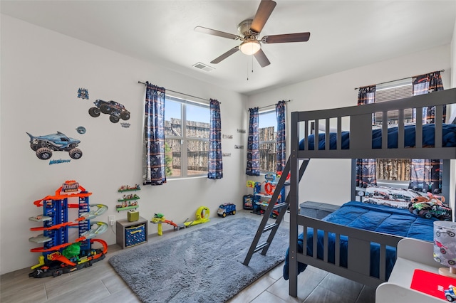 35 La Pradera, Santa Fe, NM 87508 - bedroom with a ceiling fan