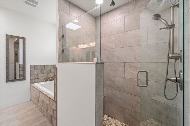 35 La Pradera, Santa Fe, NM 87508 - full bathroom with a shower stall and a garden tub