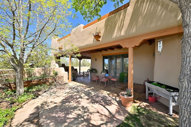 view of patio / terrace with fence