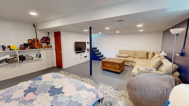 2935 Arizona, Los Alamos, NM 87544 - bedroom featuring concrete floors, recessed lighting, and a textured ceiling