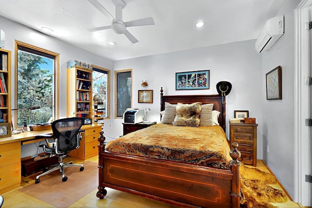 bedroom featuring a wall unit AC, an office area, recessed lighting, and ceiling fan