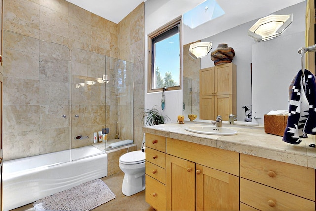 36 Green Meadow Loop, Santa Fe, NM 87506 - bathroom featuring toilet, vanity, and enclosed tub / shower combo