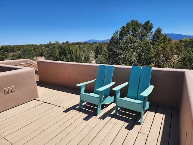deck with a mountain view
