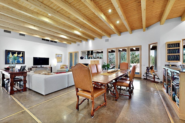 36 Green Meadow Loop, Santa Fe, NM 87506 - dining room with finished concrete floors, wood ceiling with exposed beams, and recessed lighting