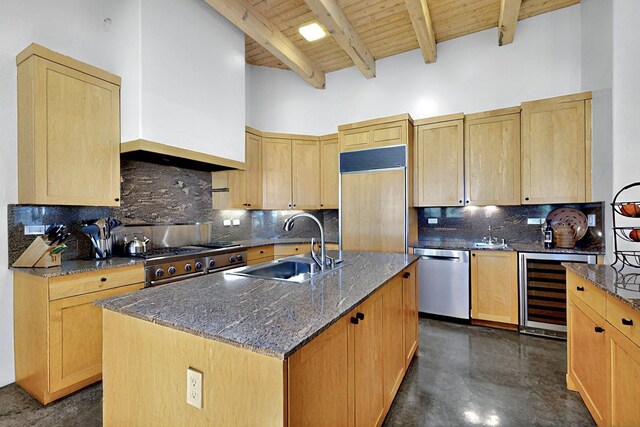 36 Green Meadow Loop, Santa Fe, NM 87506 - living area with wooden ceiling with exposed beams, concrete floors, a glass covered fireplace, and recessed lighting