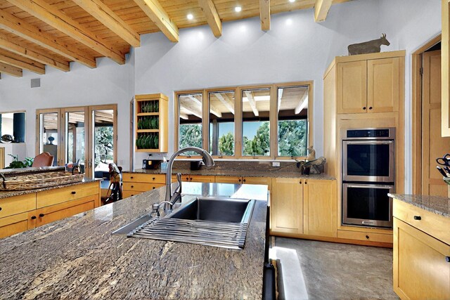 36 Green Meadow Loop, Santa Fe, NM 87506 - living room featuring wooden ceiling with exposed beams and concrete flooring