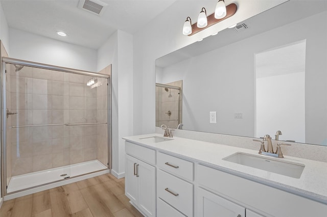 137 Mirador Blvd, Los Alamos, NM 87547 - full bath with a stall shower, wood finished floors, double vanity, and recessed lighting