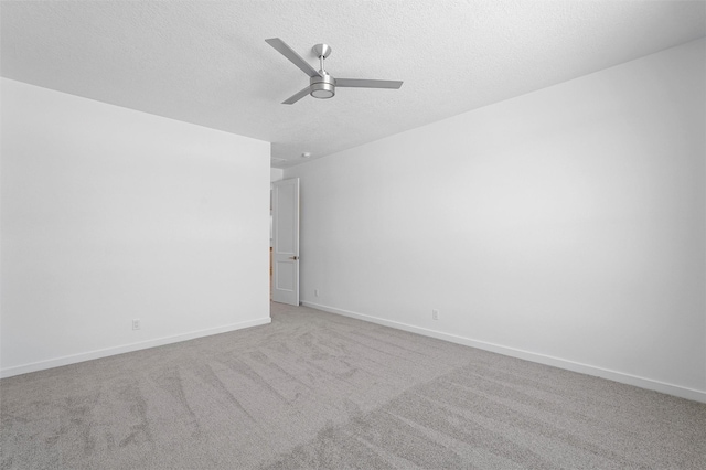137 Mirador Blvd, Los Alamos, NM 87547 - unfurnished room featuring a ceiling fan, a textured ceiling, carpet, and baseboards