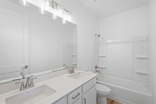 137 Mirador Blvd, Los Alamos, NM 87547 - bathroom featuring toilet, tub / shower combination, double vanity, and wood finished floors