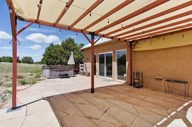 34 Ranch Rd, Lamy, NM 87540 - view of patio featuring a hot tub
