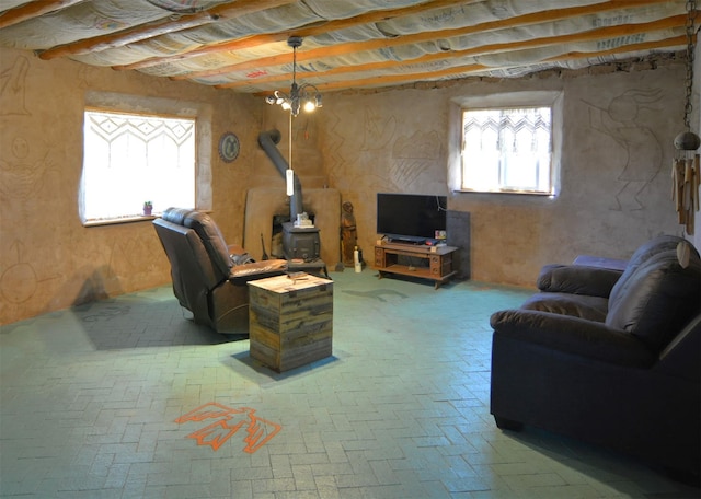 13 Los Amigos, Espanola, NM 87532 - living area featuring a wood stove and brick floors